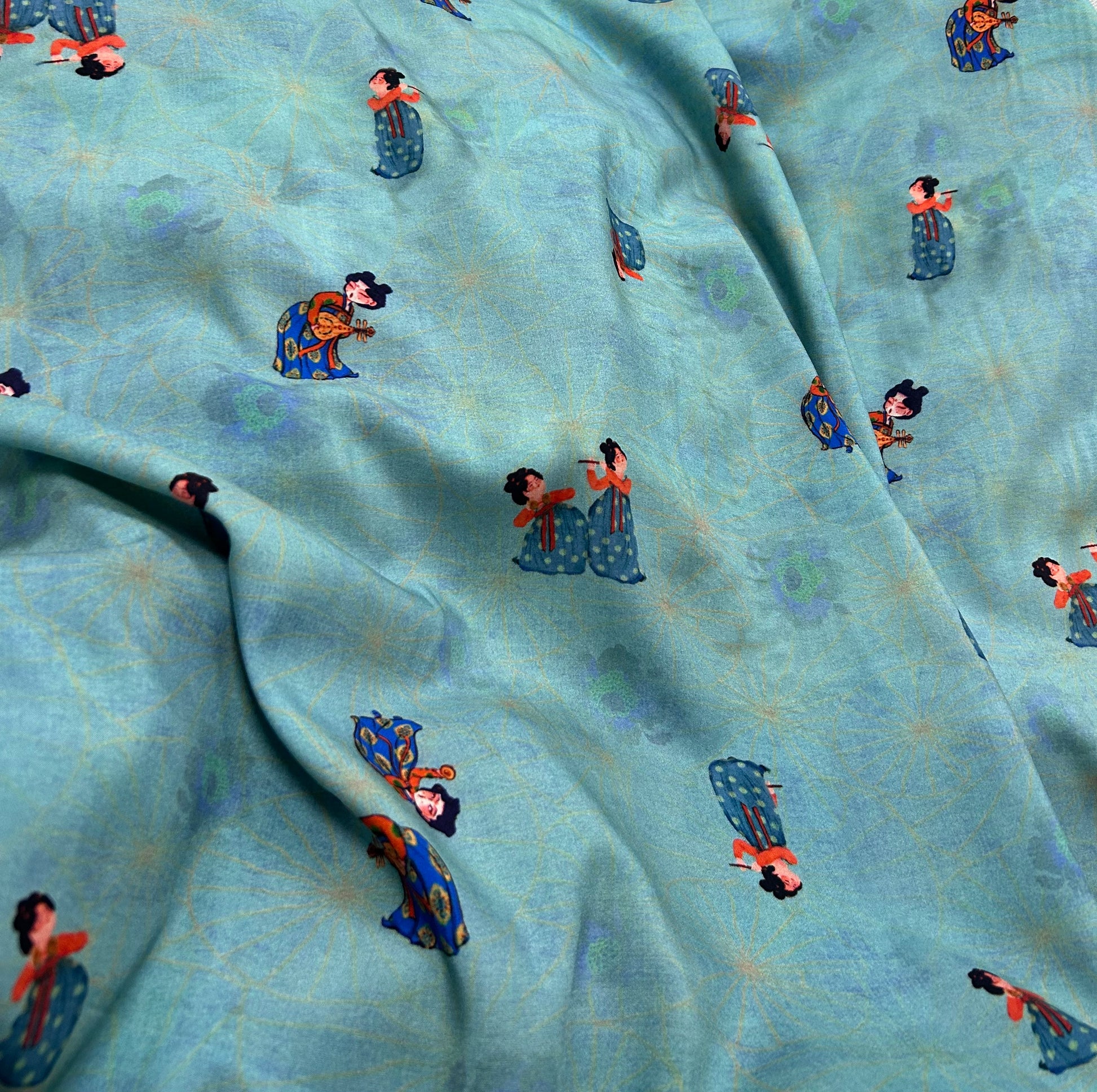 Rayon Fabric, Blue Tang Figure Print, for Vests & Dresses