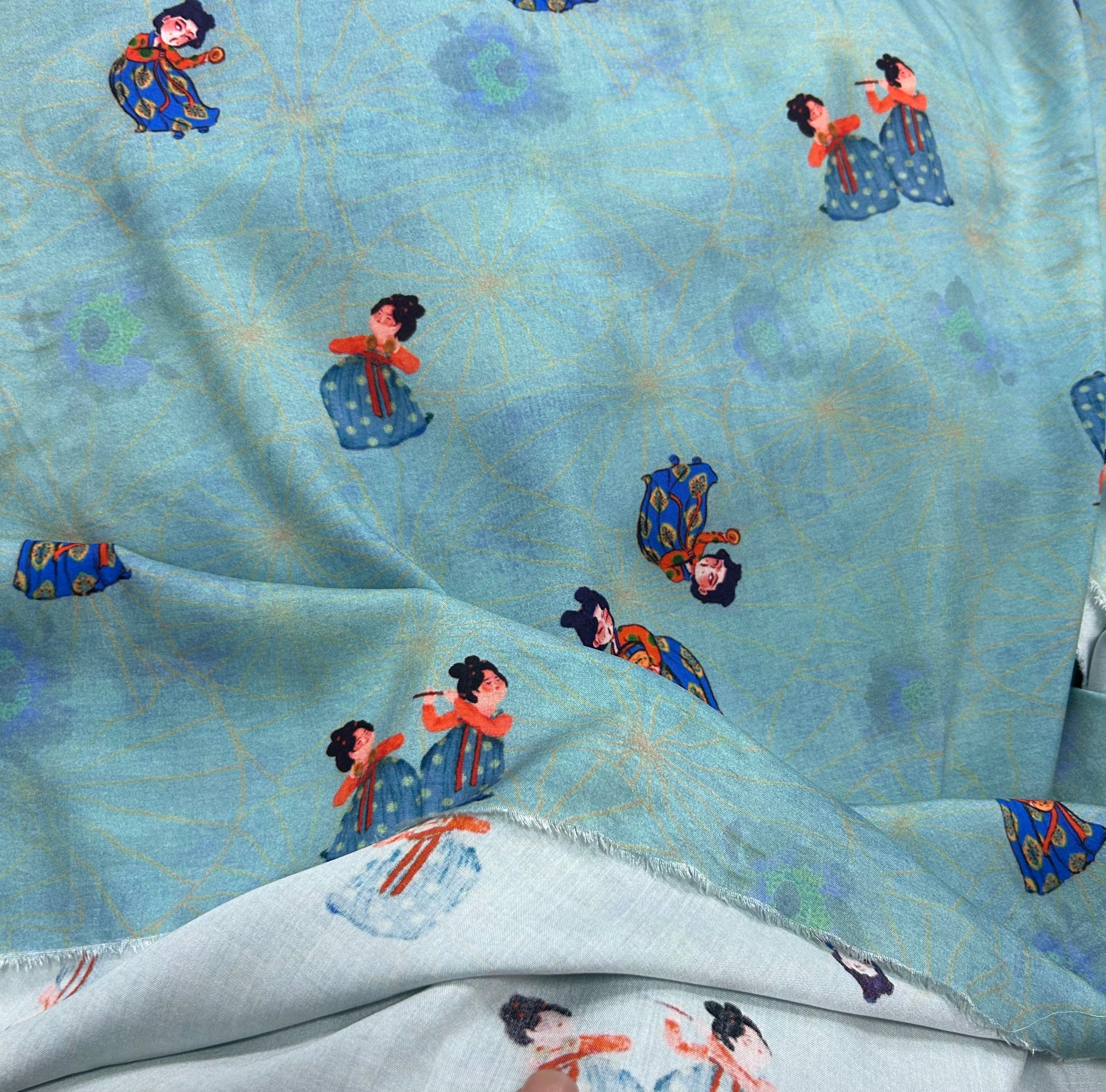 Rayon Fabric, Blue Tang Figure Print, for Vests & Dresses - Blue Tang Figure