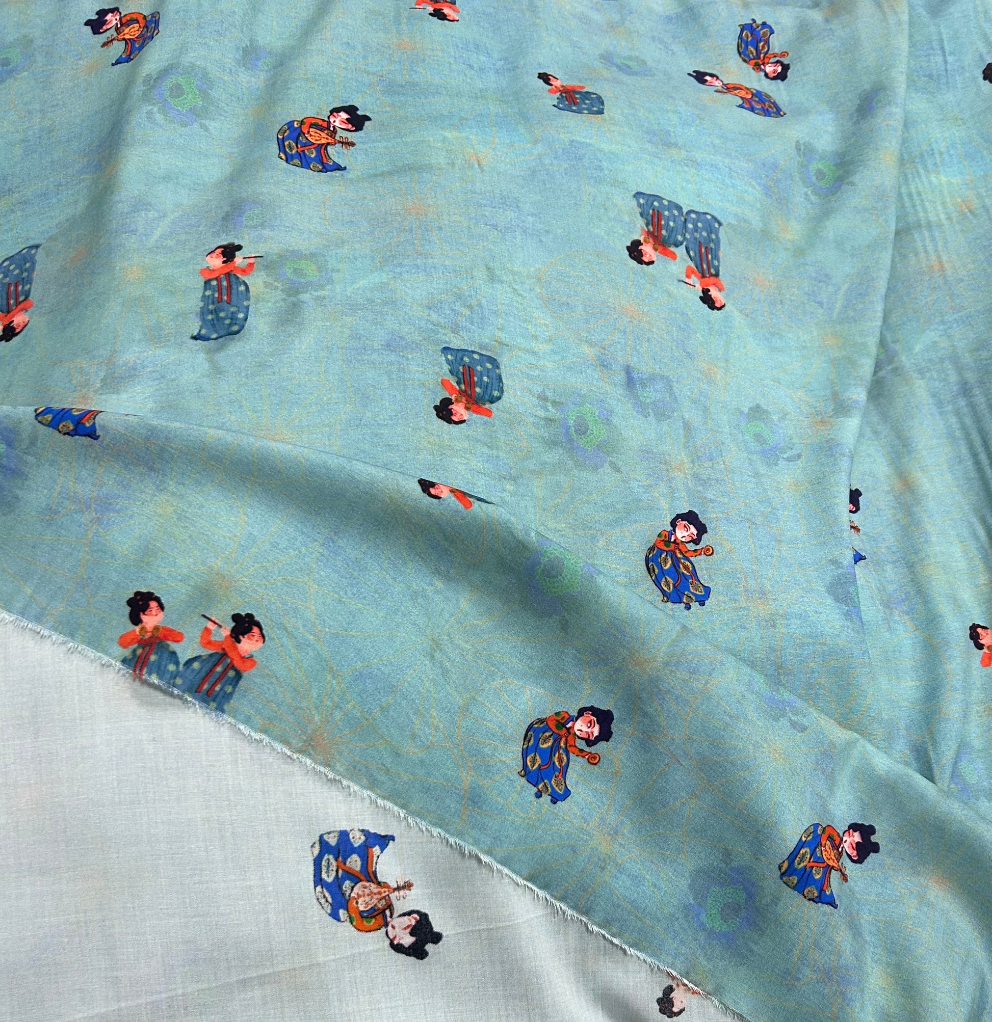 Rayon Fabric, Blue Tang Figure Print, for Vests & Dresses