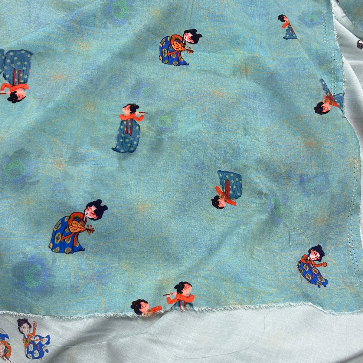 Rayon Fabric, Blue Tang Figure Print, for Vests & Dresses