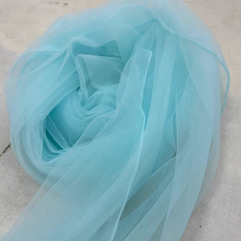 sheer-tulle-drapery-fabric-by-the-yard-wedding-event-backdrop - Ice Blue